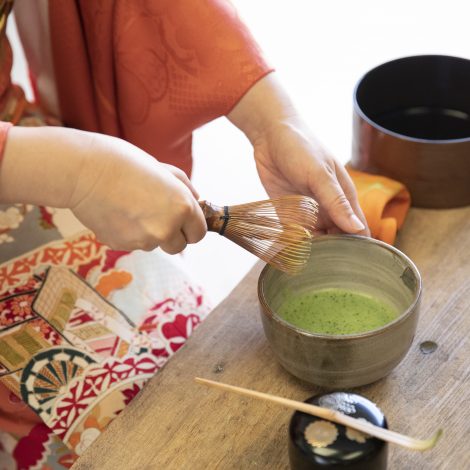 Matcha being whisked during a tea ceremony