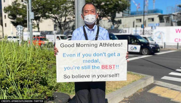 Japanese Man with Sign